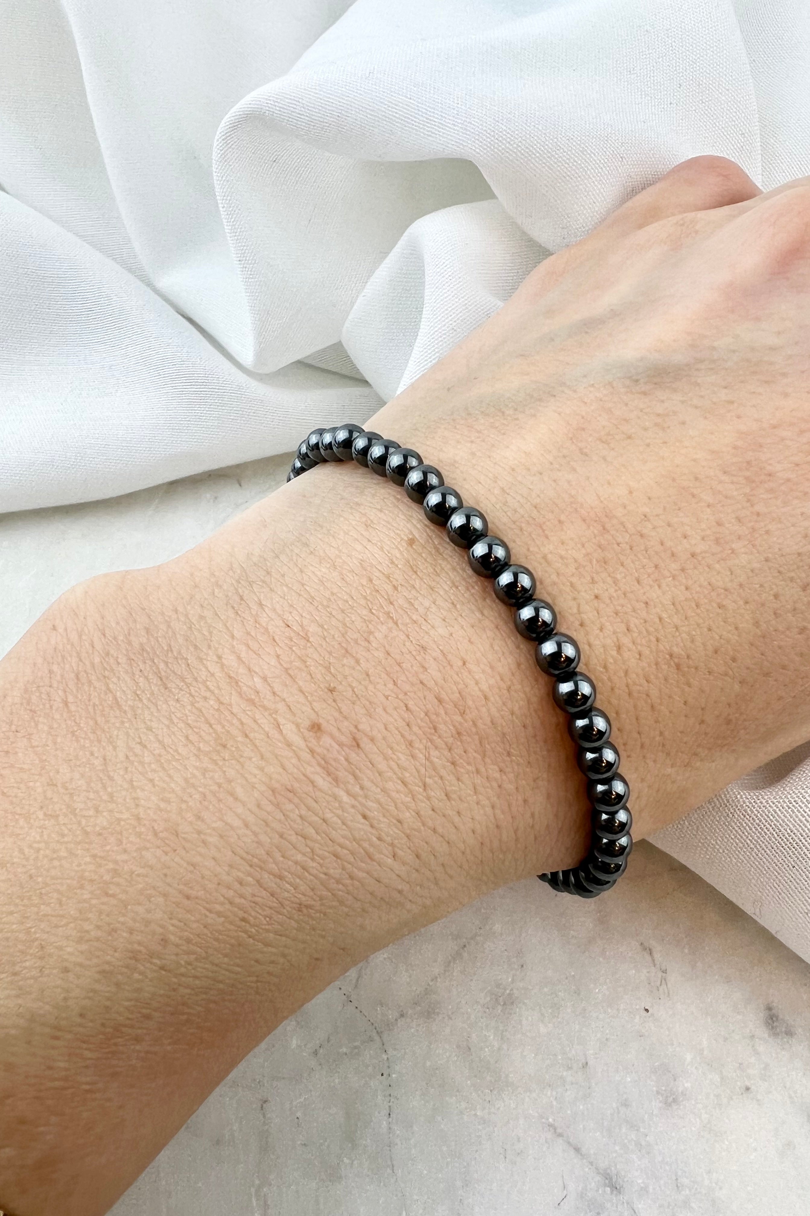 GROUNDENDE & PERFEKT TIL SØVN - KRYSTALARMBÅND